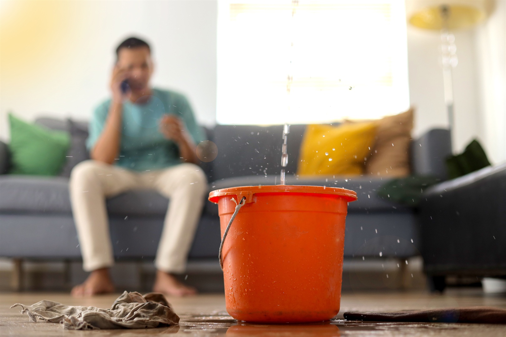 stressed-young-man-calling-home-service-to-repair